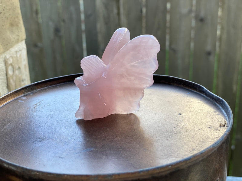 Rose Quartz Fairy with Large Wings, sitting with crossed legs and arms FB1046