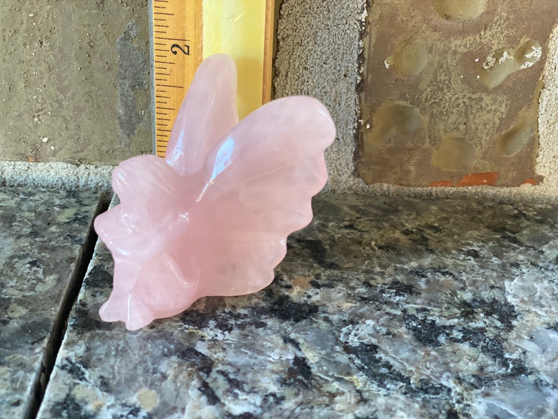 Rose Quartz Fairy with Large Wings, sitting with crossed legs and arms FB1046