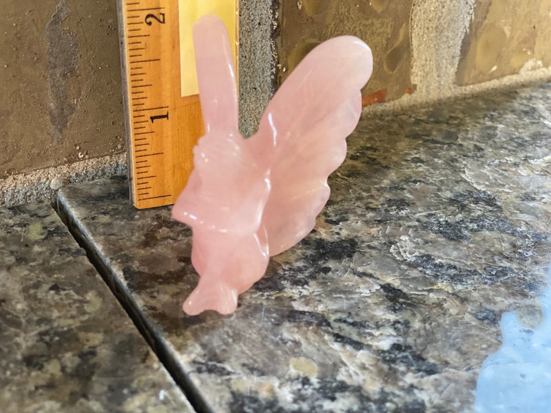 Rose Quartz Fairy with Large Wings, sitting with crossed legs and arms FB1046
