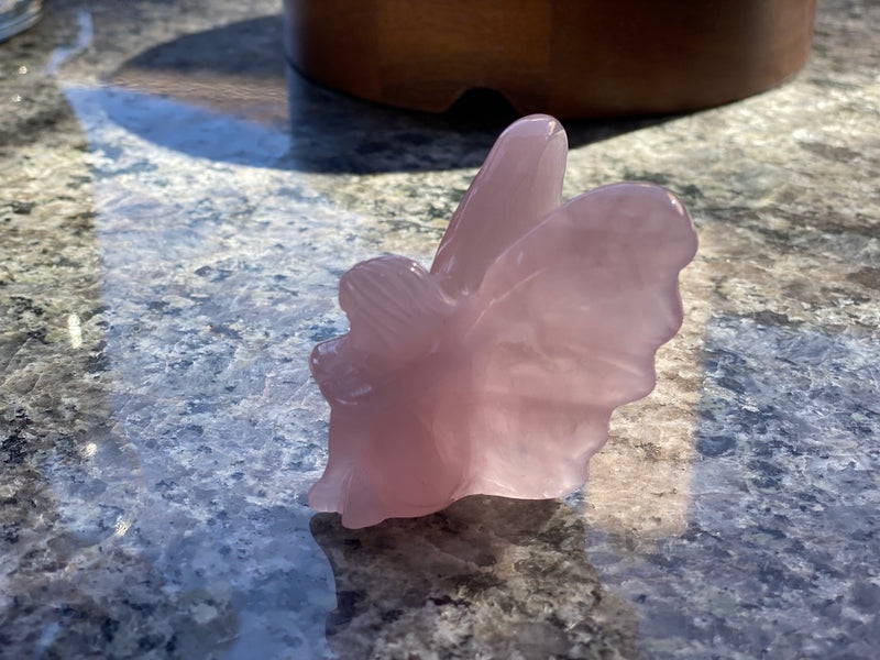 Rose Quartz Fairy with Large Wings, sitting with crossed legs and arms FB1046